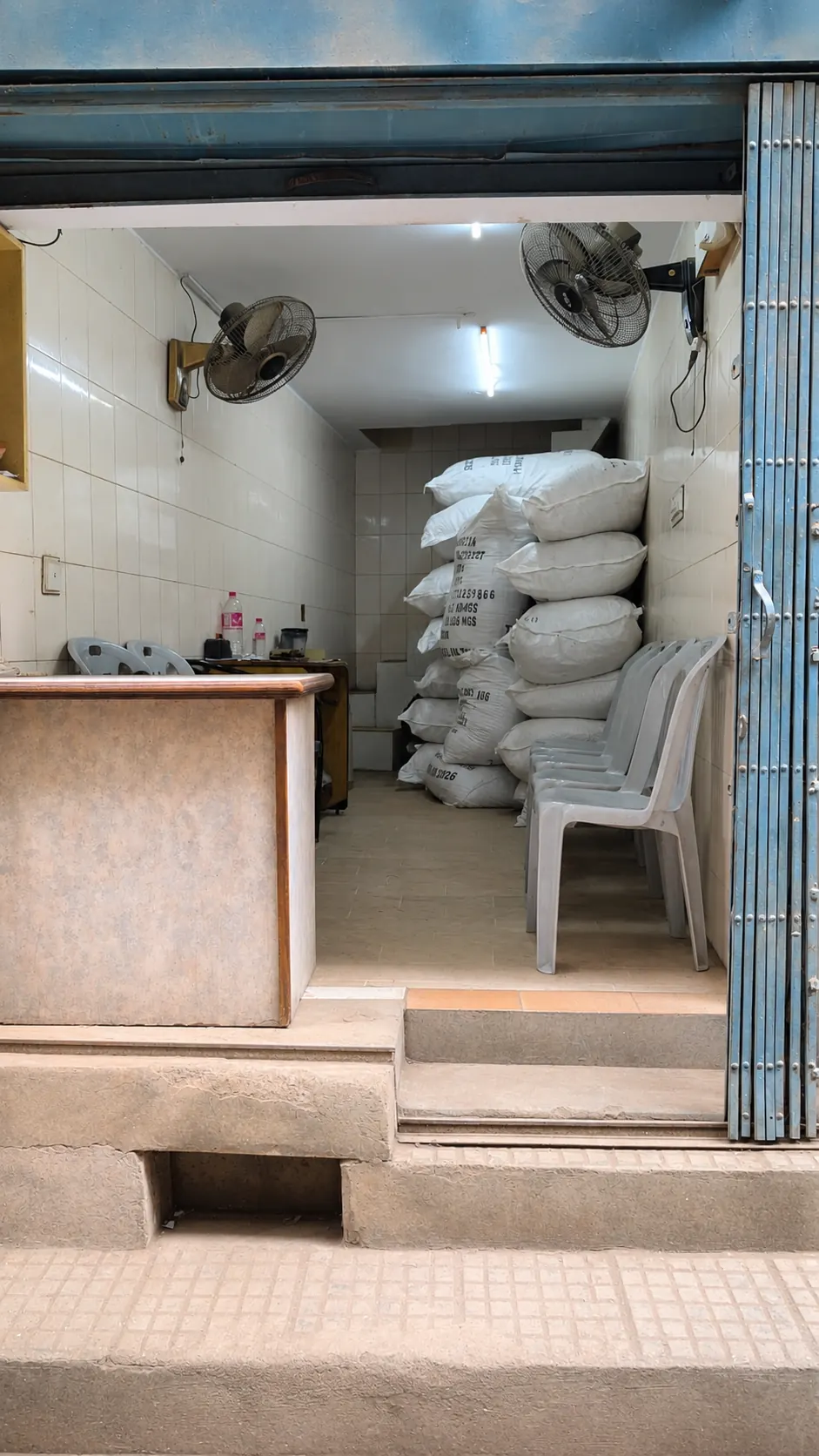 Ismail Traders shop interior in Jodia Bazar Karachi — tea sacks in stock ready for wholesale supply